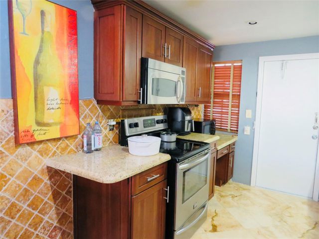 2601 S Palm Aire Drive, Pompano Beach, FL 33069