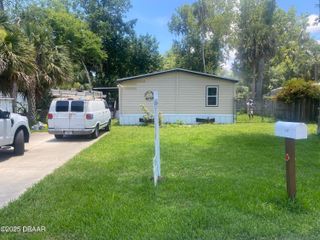 1047 Green Acres Circle N, South Daytona, FL 32119