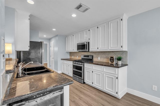 12722 Wolf Creek Court, Humble, TX 77346