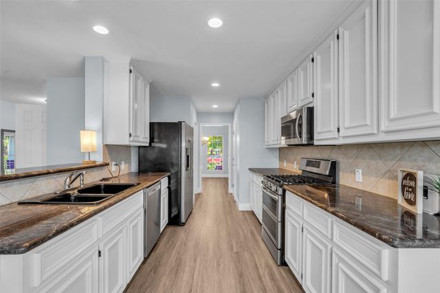 12722 Wolf Creek Court, Humble, TX 77346