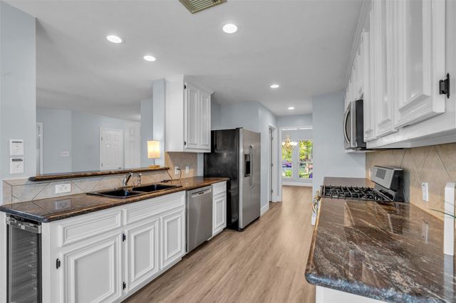 12722 Wolf Creek Court, Humble, TX 77346