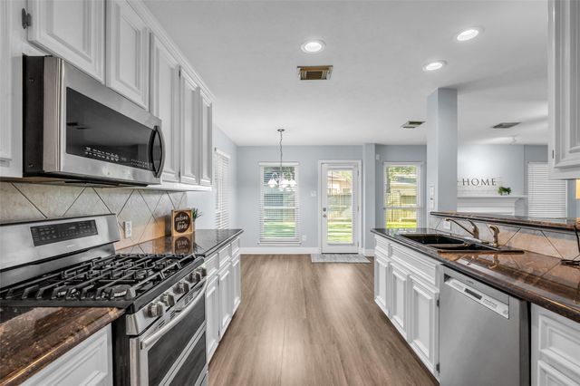 12722 Wolf Creek Court, Humble, TX 77346