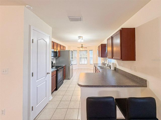 8755 FORT SOCRUM VILLAGE WAY, Lakeland, FL 33810