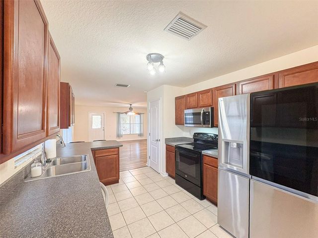 8755 FORT SOCRUM VILLAGE WAY, Lakeland, FL 33810