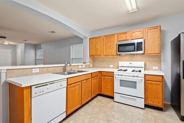 1614 Wooded Acres Drive, Humble, TX 77396