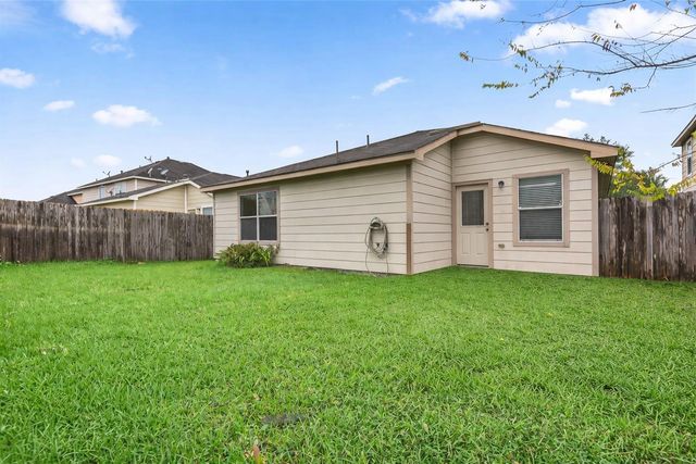 1614 Wooded Acres Drive, Humble, TX 77396