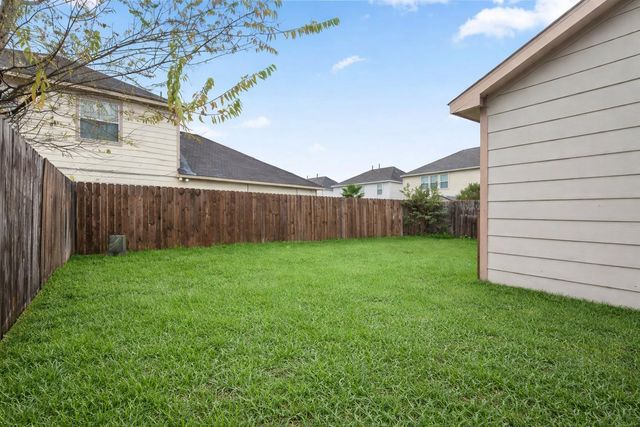 1614 Wooded Acres Drive, Humble, TX 77396
