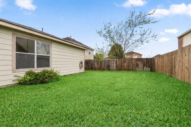 1614 Wooded Acres Drive, Humble, TX 77396