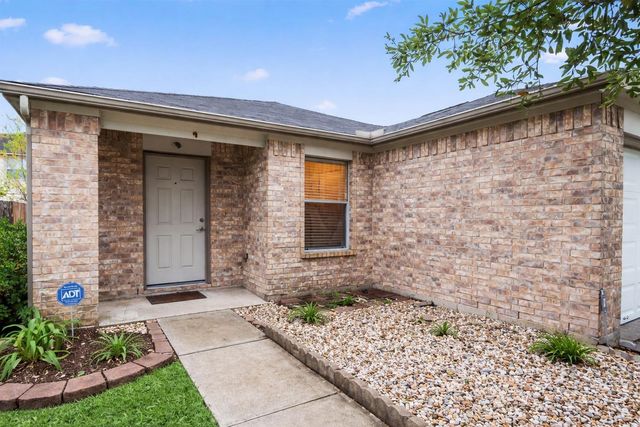 1614 Wooded Acres Drive, Humble, TX 77396