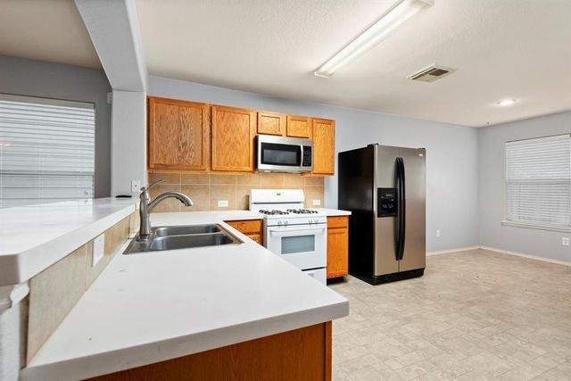 1614 Wooded Acres Drive, Humble, TX 77396