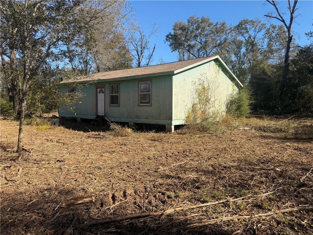 9301 Puddin Lane, Madisonville, TX 77864 — exterior