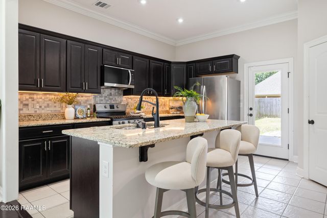 202 Caillou Grove Road, Youngsville, LA 70592