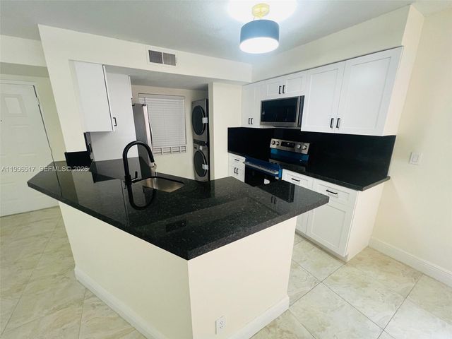 9999 Summerbreeze Drive 214, Sunrise, FL 33322
