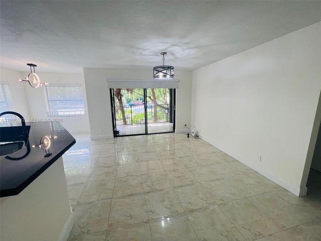 9999 Summerbreeze Drive 214, Sunrise, FL 33322