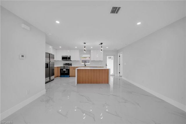 718 Frontenac AVE S, Lehigh Acres, FL 33974