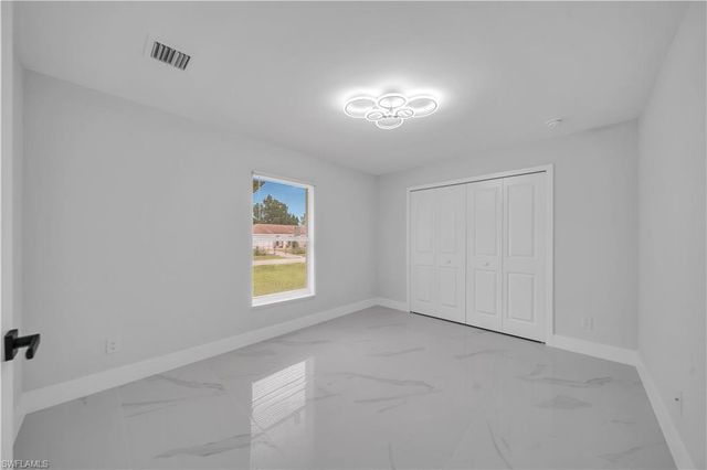 718 Frontenac AVE S, Lehigh Acres, FL 33974