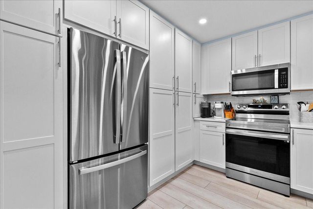 2359 TREASURE ISLE Drive 31, Palm Beach Gardens, FL 33410