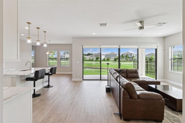 14825 PADDOCK POND AVENUE, Lithia, FL 33547