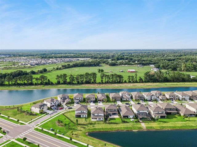 14825 PADDOCK POND AVENUE, Lithia, FL 33547