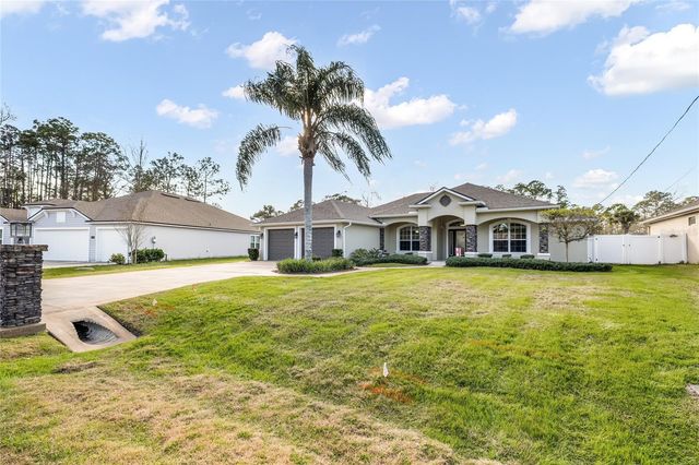 24 POINT OF WOODS DRIVE, Palm Coast, FL 32164