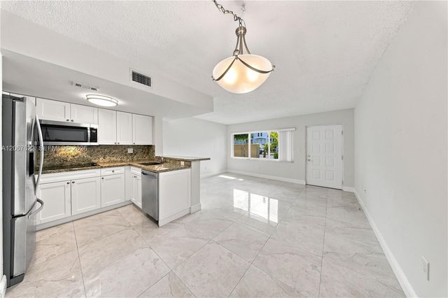 670 NW 85th Place 11-104, Miami, FL 33126