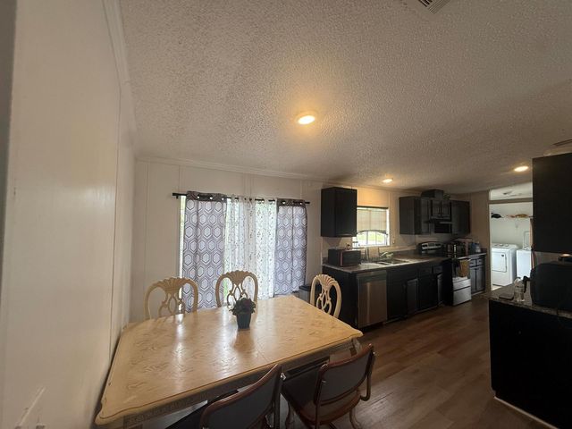 10548 W Sandalfoot Blvd, Boca Raton, FL 33428