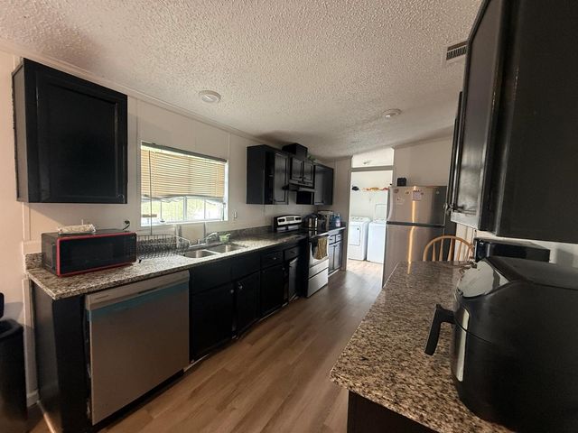 10548 W Sandalfoot Blvd, Boca Raton, FL 33428
