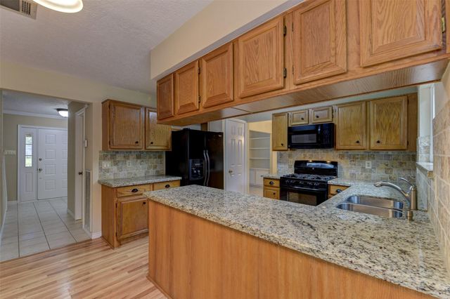 3302 Creek Shadows Drive, Houston, TX 77339