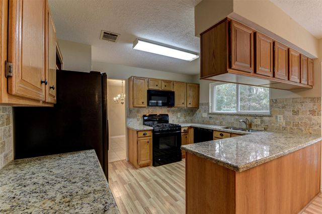 3302 Creek Shadows Drive, Houston, TX 77339