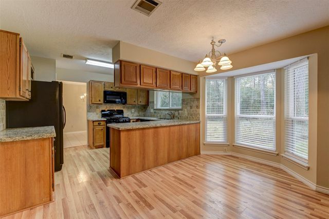 3302 Creek Shadows Drive, Houston, TX 77339