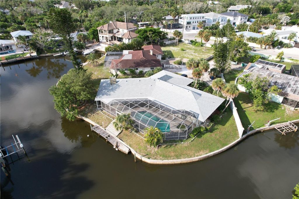 Image 1 of property listing at 6937 MIDNIGHT PASS ROAD, Sarasota, FL 34242