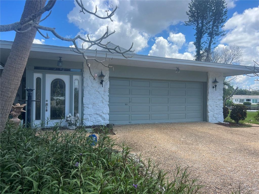 Image 2 of property listing at 6937 MIDNIGHT PASS ROAD, Sarasota, FL 34242