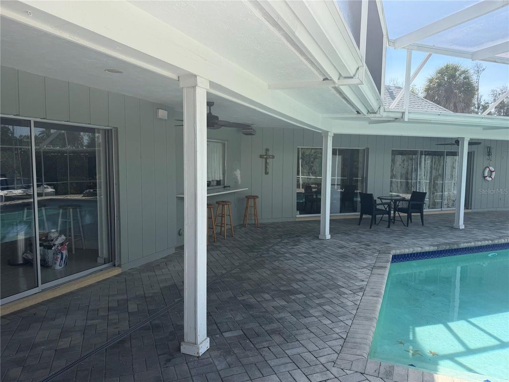 Image 36 of property listing at 6937 MIDNIGHT PASS ROAD, Sarasota, FL 34242