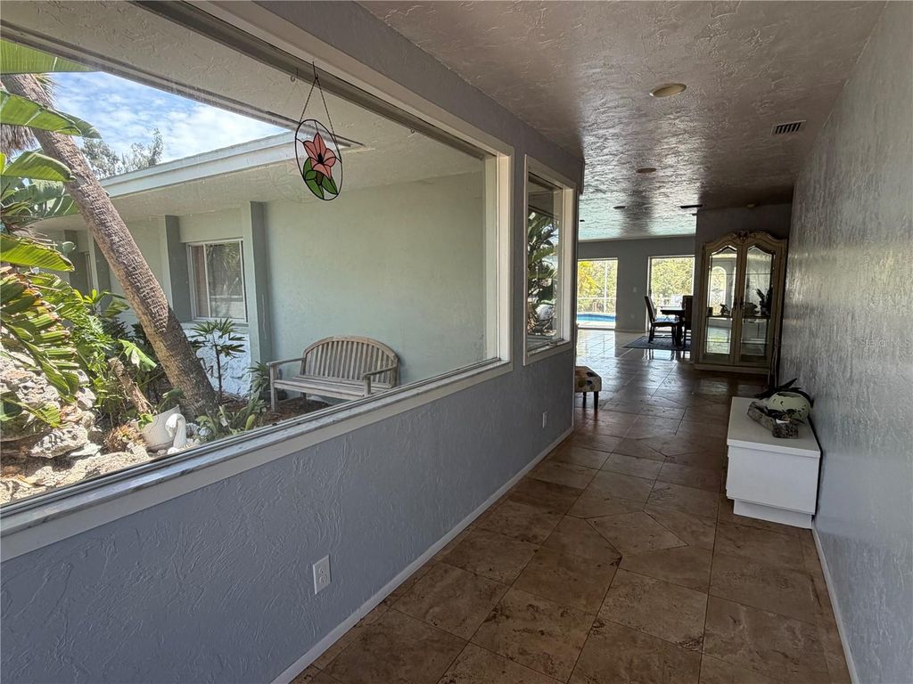 Image 38 of property listing at 6937 MIDNIGHT PASS ROAD, Sarasota, FL 34242