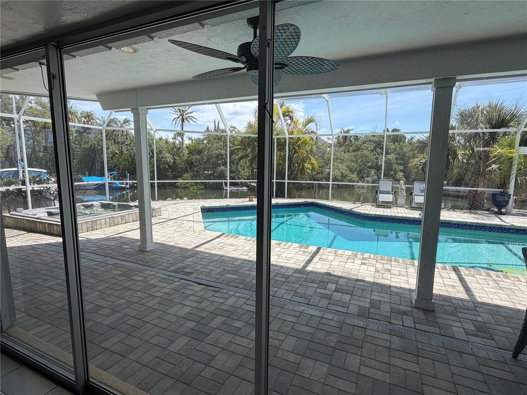 Image 41 of property listing at 6937 MIDNIGHT PASS ROAD, Sarasota, FL 34242