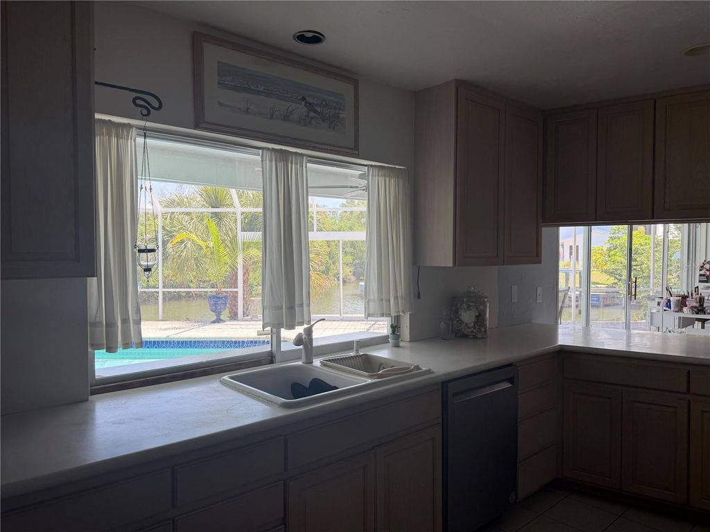 Image 45 of property listing at 6937 MIDNIGHT PASS ROAD, Sarasota, FL 34242