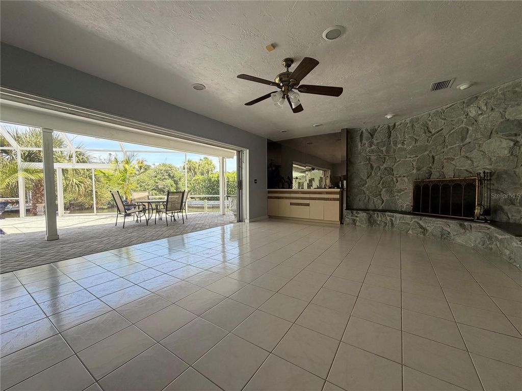 Image 47 of property listing at 6937 MIDNIGHT PASS ROAD, Sarasota, FL 34242