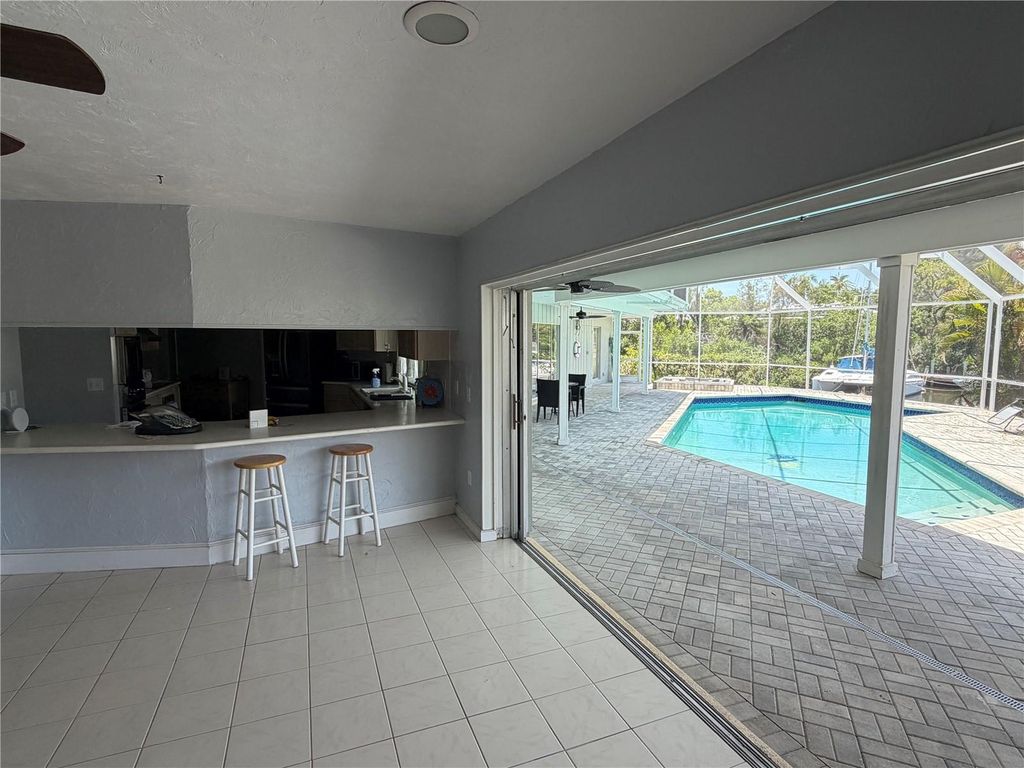 Image 48 of property listing at 6937 MIDNIGHT PASS ROAD, Sarasota, FL 34242