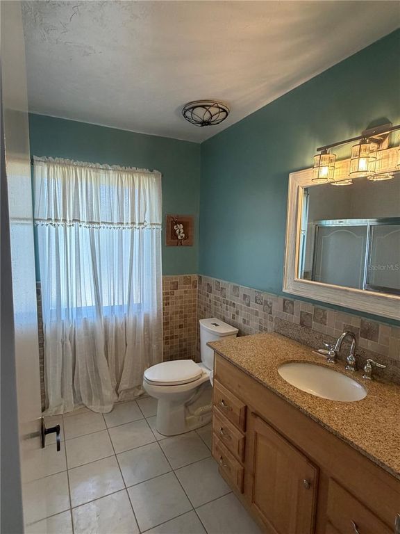 Image 49 of property listing at 6937 MIDNIGHT PASS ROAD, Sarasota, FL 34242