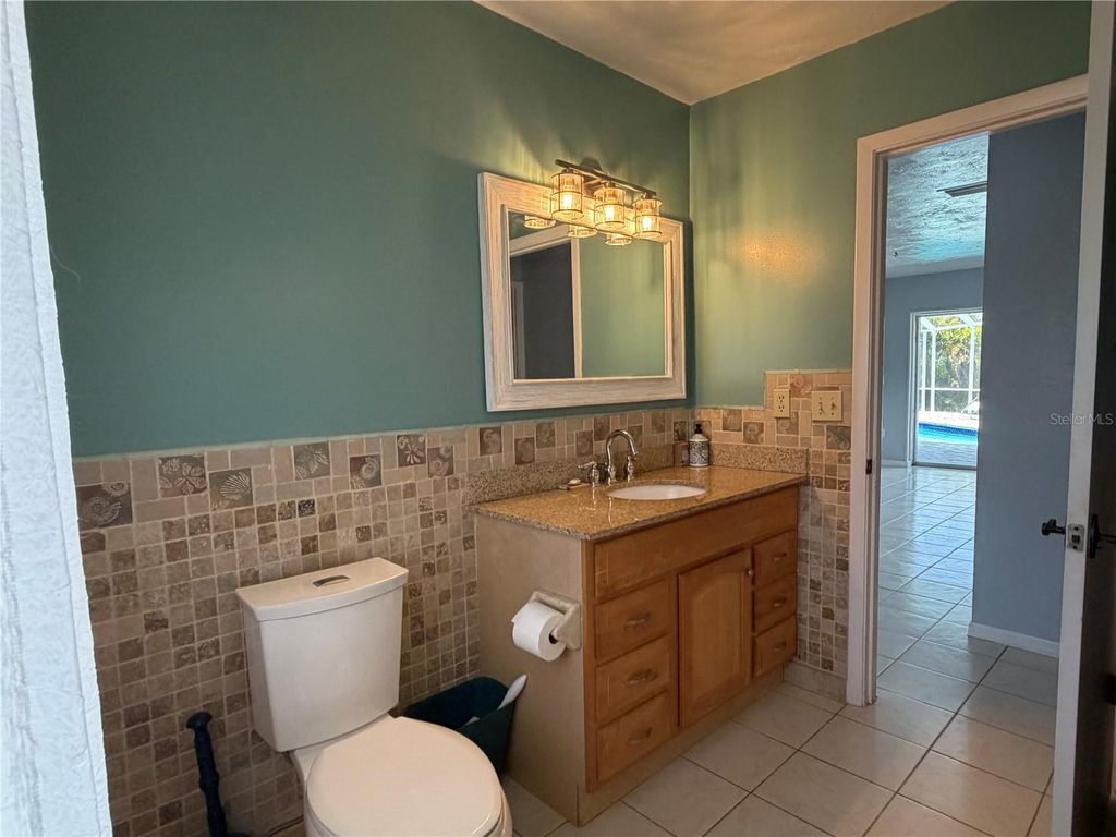 Image 50 of property listing at 6937 MIDNIGHT PASS ROAD, Sarasota, FL 34242