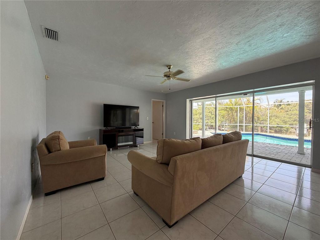 Image 53 of property listing at 6937 MIDNIGHT PASS ROAD, Sarasota, FL 34242