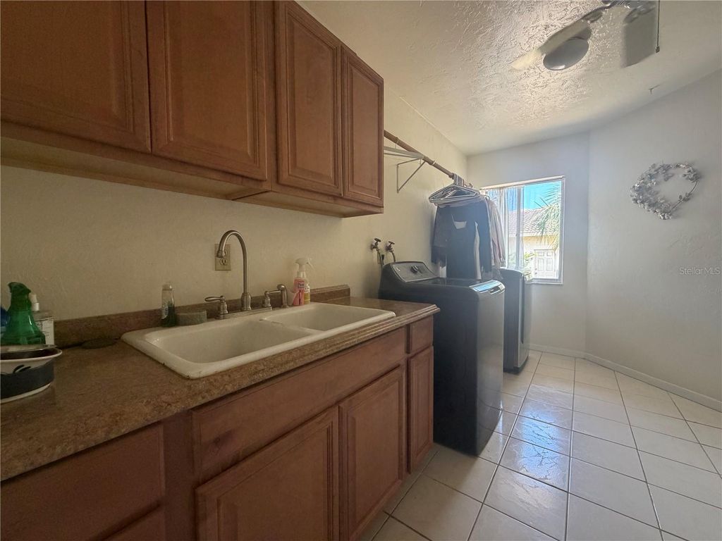 Image 60 of property listing at 6937 MIDNIGHT PASS ROAD, Sarasota, FL 34242