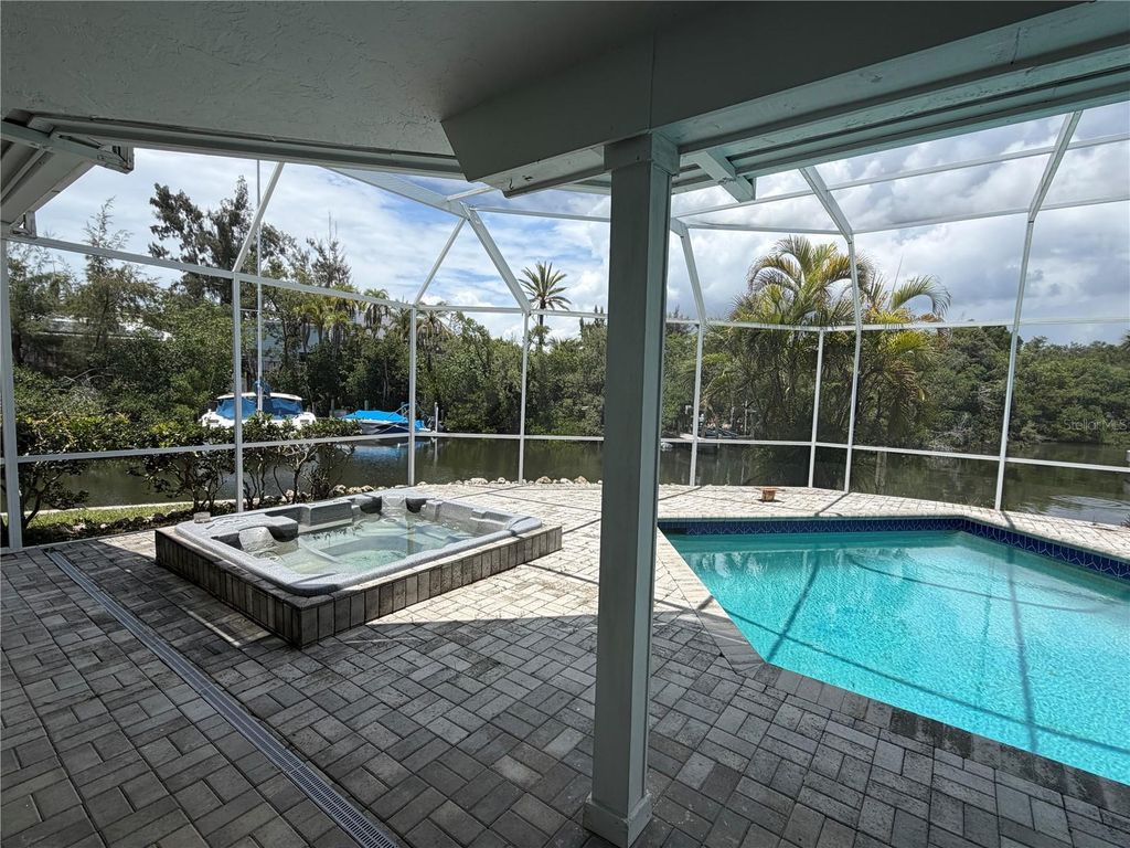 Image 61 of property listing at 6937 MIDNIGHT PASS ROAD, Sarasota, FL 34242