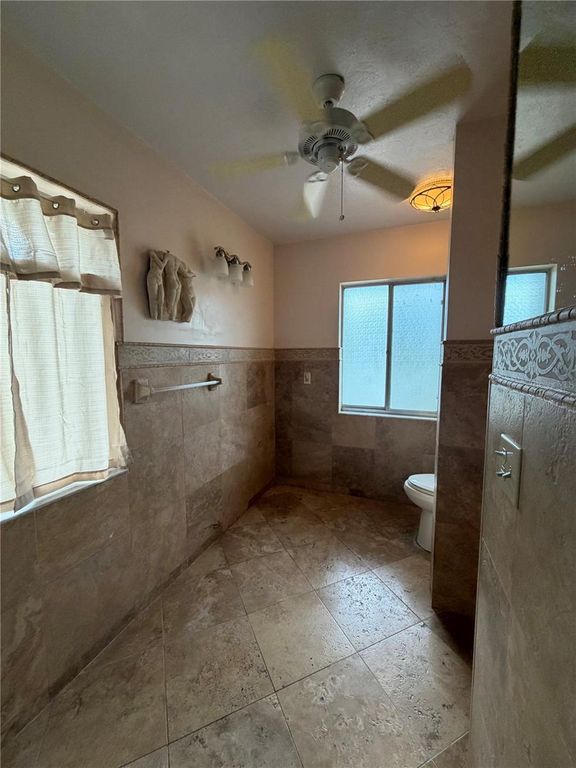 Image 64 of property listing at 6937 MIDNIGHT PASS ROAD, Sarasota, FL 34242