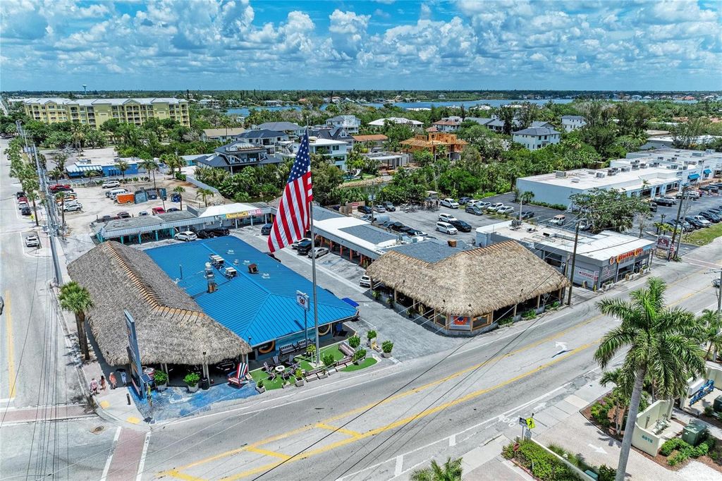 Image 75 of property listing at 6937 MIDNIGHT PASS ROAD, Sarasota, FL 34242