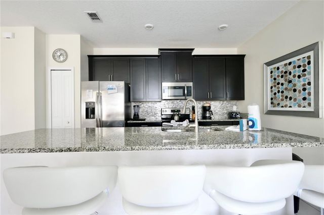 9063 DOGLEG DRIVE, Davenport, FL 33896