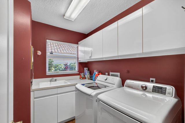 923 Augusta Pointe Drive, Palm Beach Gardens, FL 33418