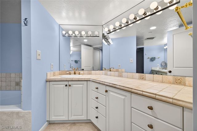 6020 PELICAN BAY BLVD E302, Naples, FL 34108