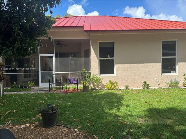 115 Kapok Crescent, Royal Palm Beach, FL 33411
