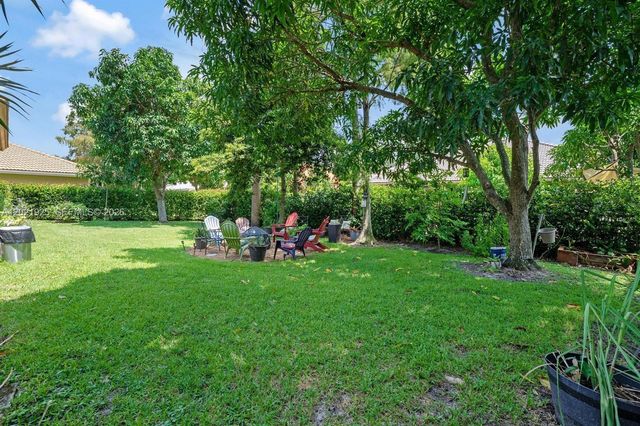 115 Kapok Crescent, Royal Palm Beach, FL 33411